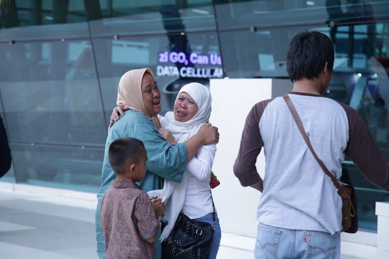 <p>Pekerja Migran Indonesia dari Yordania berhasil tiba di bandara Soekarno-Hatta, Jumat (17 Mei 2019). Foto: Kemenaker </p>
