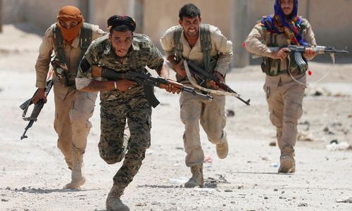 <p>Kurdish fighters from the People&#8217;s Protection Units (YPG) run across a street in Raqqa, Syria, July 3, 2017. Goran Tomasevic: &#8220;They were members of Kurdish YPG militia. They were running across the street because ISIS fighters&#8217; positions were nearby. I shot the picture in a last day of my assignment. I was lucky to have that picture as YPG fighters were giving very restricted access to media.&#8221; REUTERS/ Goran Tomasevic/File Photo SEARCH &#8220;POY IS&#8221; FOR THIS STORY. SEARCH &#8220;REUTERS POY&#8221; FOR ALL BEST OF 2017 PACKAGES. TPX IMAGES OF THE DAY &#8211; RC164AFF4C20</p>
