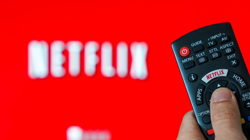 <p>Mandatory Credit: Photo by Isopix/REX/Shutterstock (10184354a)<br />
Illustration of the video streaming company Netflix. Logo Netflix on the keyboard of a remote control in front of a TV.<br />
Netflix, Belgium – 01 Apr 2019</p>
