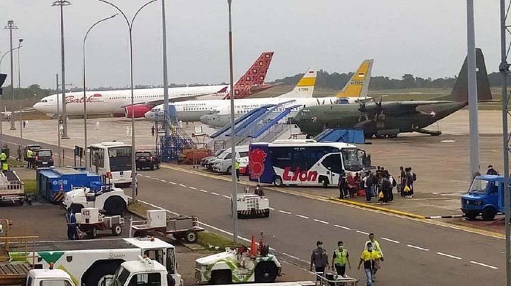 <p>pesawat yang mengangkut WNI dari Wuhan tiba di Batam</p>
