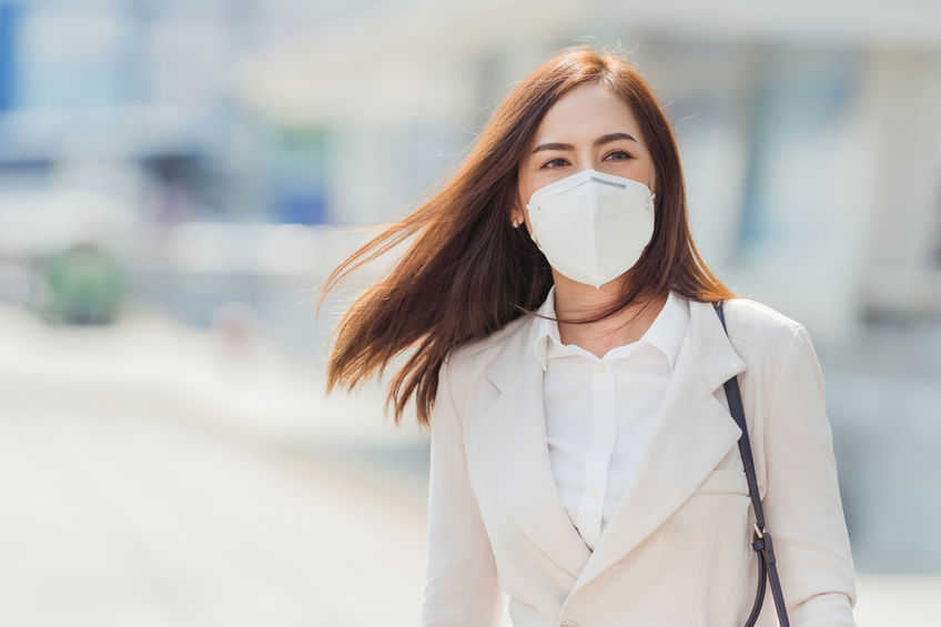 <p>Asian woman are going to work.she wears N95 mask.Prevent PM2.5 dust and smog</p>
