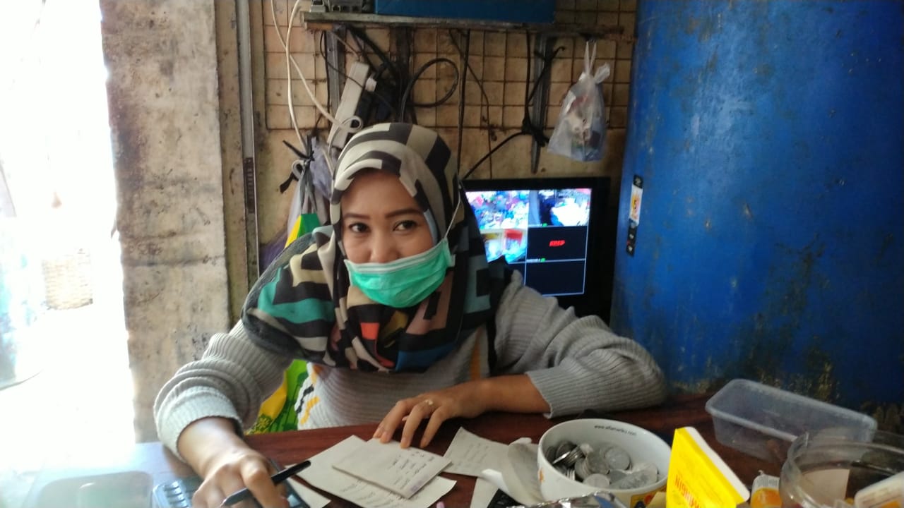 Wina, Pemilik Toko Makmur Murni Pasar Minulyo Pacitan