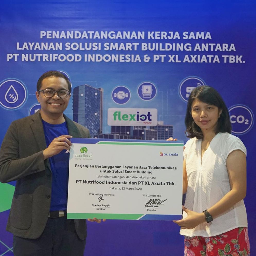 Penandatanganan kerjasama layanan Solusi Smart Building antara PT Nutrifood Indonesia dengan XL Axiata.