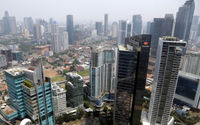 <p>Lanskape gedung perkantoran dan hunian vertikal diambil dari kawasan Mega Kuningan, Jakarta. Foto: Ismail Pohan/TrenAsia</p>

