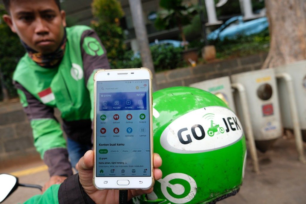 <p>GoPay, layanan uang elektronik PT Aplikasi Karya Anak Bangsa (Gojek Indonesia) mendorong pengguna untuk mengaktifkan fitur biometrik berupa sidik jari dan verifikasi wajah. / Foto: Ismail Pohan &#8211; Tren Asia</p>
