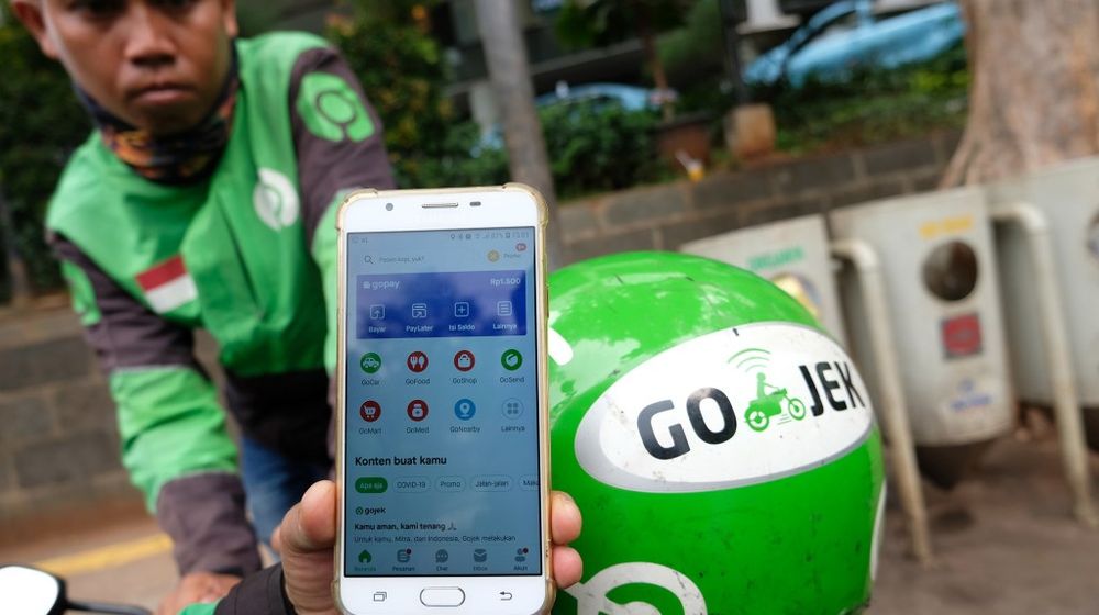 <p>GoPay, layanan uang elektronik PT Aplikasi Karya Anak Bangsa (Gojek Indonesia) mendorong pengguna untuk mengaktifkan fitur biometrik berupa sidik jari dan verifikasi wajah. / Foto: Ismail Pohan – Tren Asia</p>
