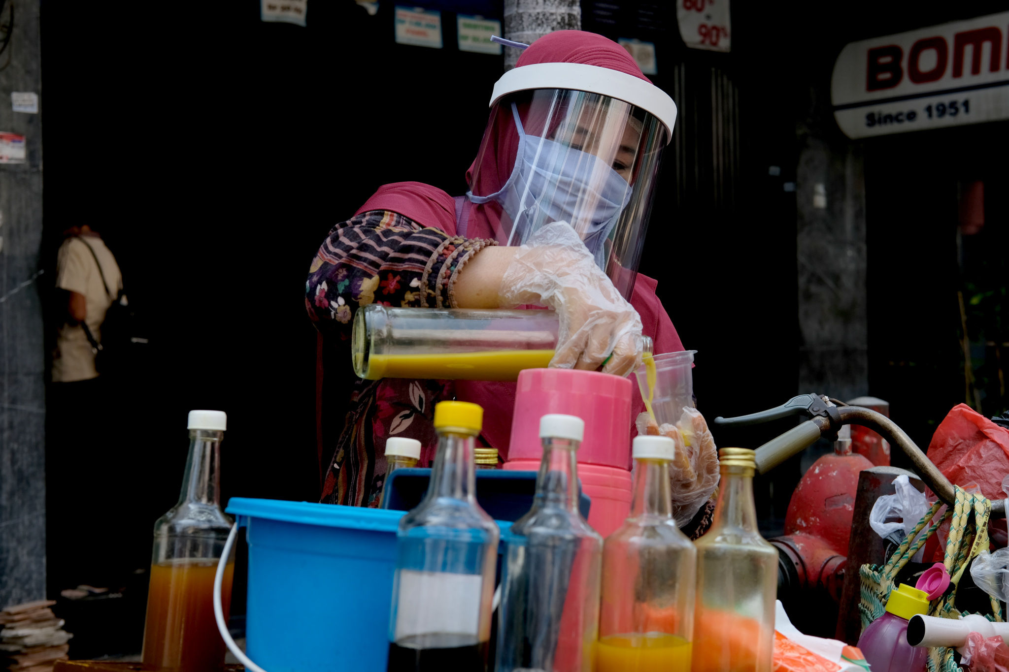 <p>Ilustrasi penjual jamu. Foto: Ismail Pohan/TrenAsia </p>
