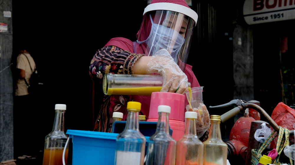 <p>Ilustrasi penjual jamu. Foto: Ismail Pohan/TrenAsia </p>
