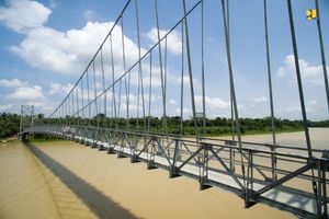 <p>Ilustrasi pembangunan jembatan gantung. / Dok. kementerian PUPR</p>
