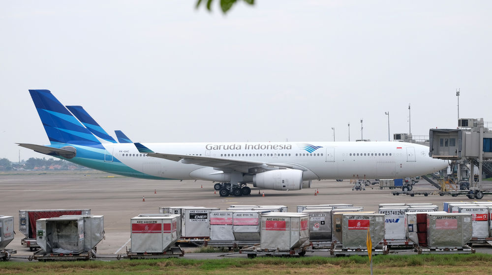 <p>Maskapai penerbangan Garuda Indonesia tampak terparkir di Bandara Soekarno Hatta, Tangerang, Banten.. Foto: Ismail Pohan/TrenAsia</p>