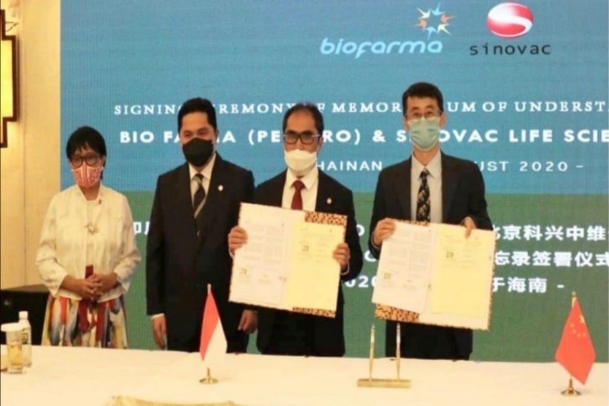 <p>Penandatanganan kerja sama antara PT Bio Farma dan Sinovac Biotech China dalam pengadaan vaksin COVID-19. / Bumn.go.id</p>
