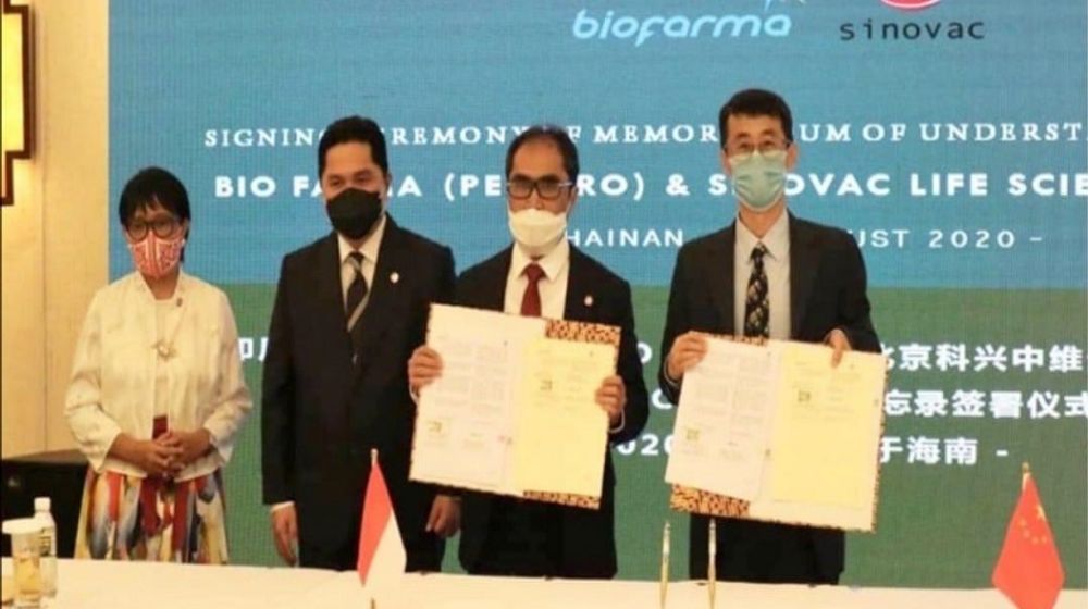 <p>Penandatanganan kerja sama antara PT Bio Farma dan Sinovac Biotech China dalam pengadaan vaksin COVID-19. / Bumn.go.id</p>