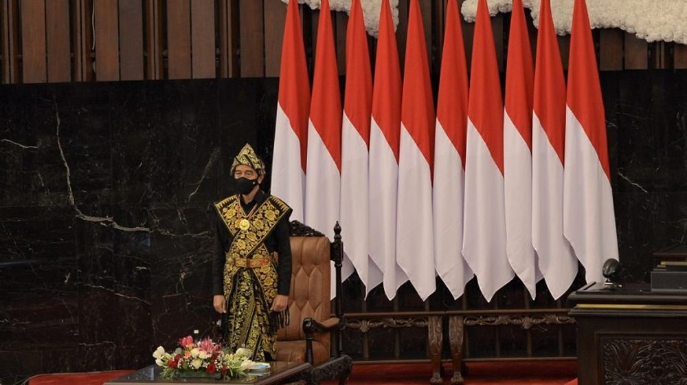 <p>Presiden Jokowi sebelum menyampaikan Pidato pada Sidang Tahunan MPR RI dan Sidang Bersama DPR RI dan DPD RI Dalam Rangka HUT Ke-75 Proklamasi Kemerdekaan RI, Jumat 14 Agustus 2020/ Foto: DPR RI)</p>
