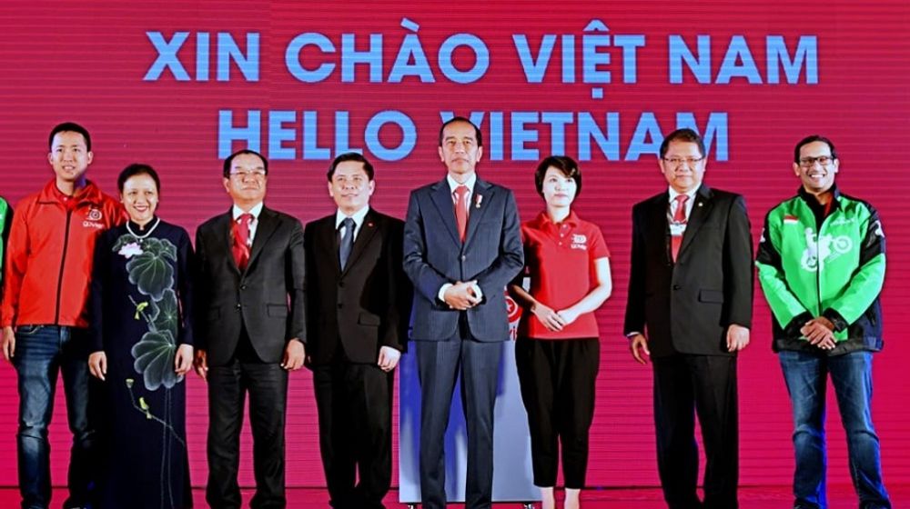 <p>Presiden Joko Widodo menghadiri peluncuran Gojek di Vietnam bernama Goviet bersama pendiri Gojek Nadiem Anwar Makarim pada 12 September 2018. / Setkab.go.id</p>
