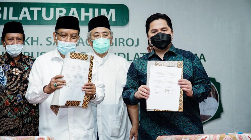 <p>Menteri BUMN Erick Thohir dan Ketua Umum PBNU Said Aqil saat menandatangani MoU / Dok. Kementerian BUMN</p>