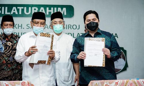 <p>Menteri BUMN Erick Thohir dan Ketua Umum PBNU Said Aqil saat menandatangani MoU / Dok. Kementerian BUMN</p>
