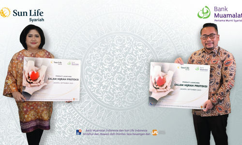 <p>Chief Distribution Officer Sun Life Indonesia, Danning Wikanti bersama Retail Banking Director Bank Muamalat Indonesia Purnomo B. Soetadi / Dok. Sun Life Indonesia</p>
