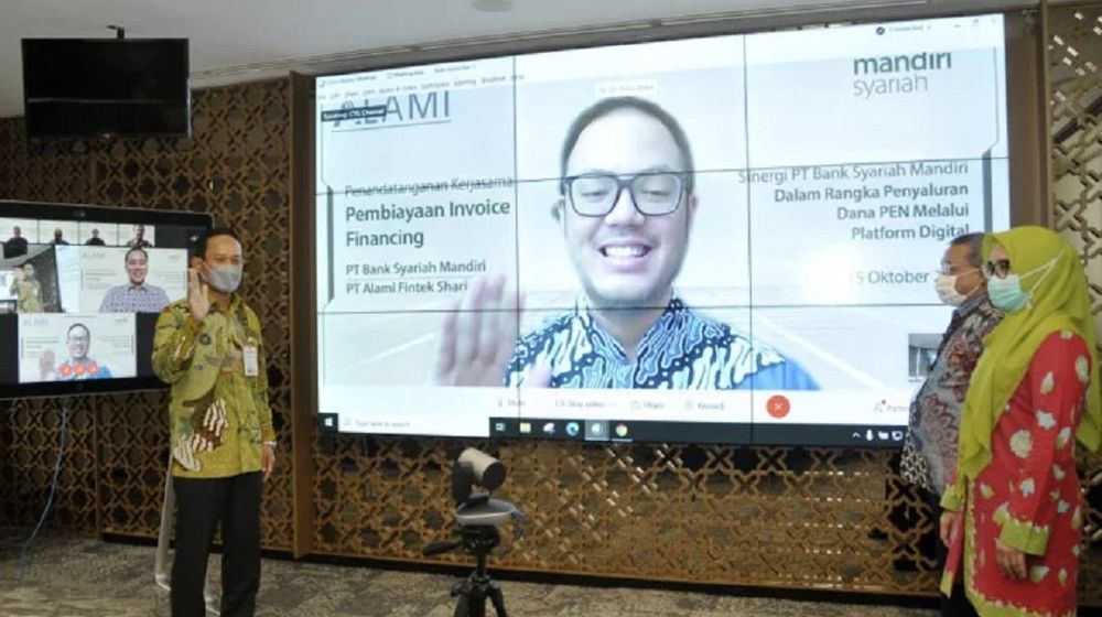 <p>Kerja sama PT Bank Syariah Mandiri (BSM) dengan PT Alami Fintek Sharia (Alami) / Dok. BSM</p>
