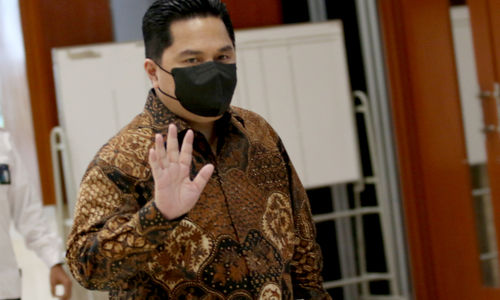<p>Menteri Badan Usaha Milik Negara (BUMN) Erick Thohir saat akan mengikuti rapat kerja dengan Komisi xI DPR di Kompleks Parlemen, Senayan, Jakarta, Senin, 30 November 2020. Foto: Ismail Pohan/TrenAsia</p>
