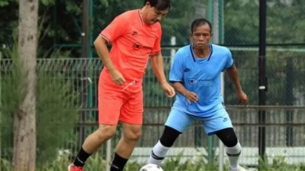 <p>Ricky Yakobi (oranye)/Kemenpora</p>
