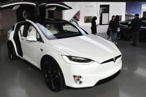 Ilustrasi mobil Tesla.