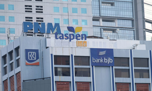 <p>Gedung Taspen PNM di kawasan Sudirman, Jakarta, Senin, 22 Februari 2021. Foto: Ismail Pohan/TrenAsia</p>
