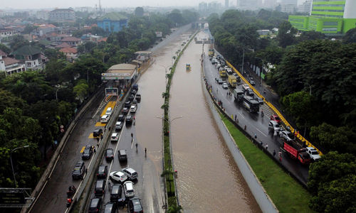 <p>Foto aerial suasana ruas jalan tol yang terendam banjir di TB Simatupang, Jakarta Selatan, Sabtu, 20 Februari 2021. Foto : Panji Asmoro/TrenAsia</p>
