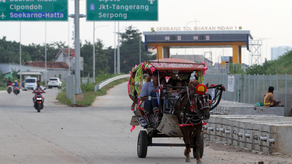 <p>Suasana pengerjaan proyek jalan tol Kunciran-Cengkareng, Jum’at, 12 Februari 2021. Foto: Panji Asmoro/TrenAsia</p>
