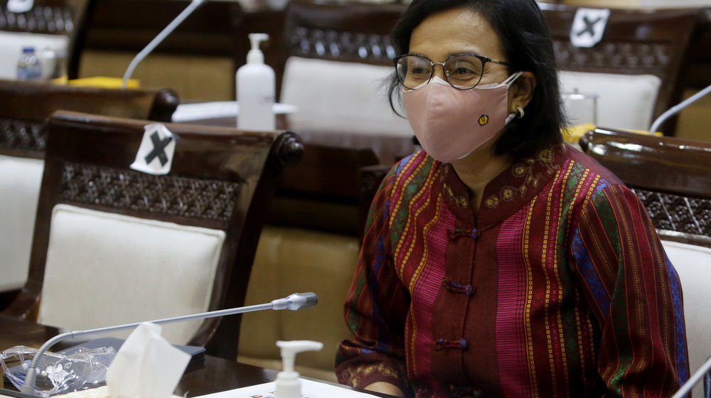 <p>Menteri Keuangan, Sri Mulyani saat hadir dalam rapat kerja dengan Komisi XI di kompleks Parlemen, Senayan, Jakarta, Senin, 15 Maret 2021. Foto: Ismail Pohan/TrenAsia</p>
