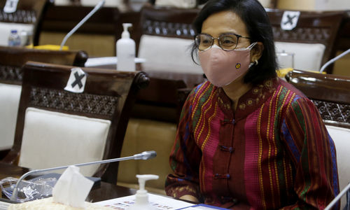 <p>Menteri Keuangan, Sri Mulyani saat hadir dalam rapat kerja dengan Komisi XI di kompleks Parlemen, Senayan, Jakarta, Senin, 15 Maret 2021. Foto: Ismail Pohan/TrenAsia</p>

