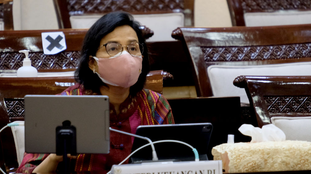 <p>Menteri Keuangan, Sri Mulyani saat hadir dalam rapat kerja dengan Komisi XI di kompleks Parlemen, Senayan, Jakarta, Senin, 15 Maret 2021. Foto: Ismail Pohan/TrenAsia</p>
