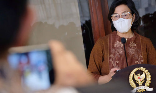 <p>Menteri Keuangan, Sri Mulyani memberikan keterangan pers terkait pertumbuhan ekonomi di kompleks Parlemen Senayan, Jakarta, Kamis, 20 Mei 2021. Foto: Ismail Pohan/TrenAsia</p>
