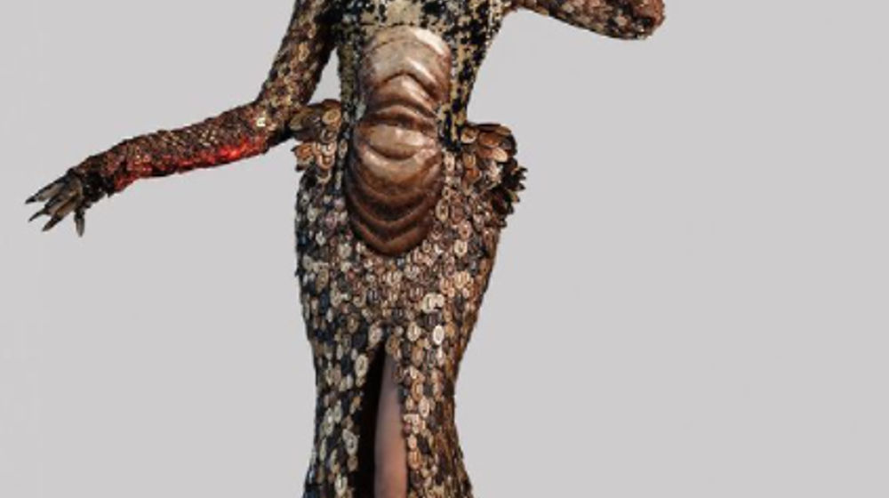<p>Kostum bertema “Komodo Dragon: an Indonesian Prehistoric Heritage” yang dibawakan oleh Ayu Maulida pada babak National Costume Miss Universe di Florida, Amerika Serikat, Kamis, 13 Mei 2021. / Instagram @officialputeriindonesia</p>
