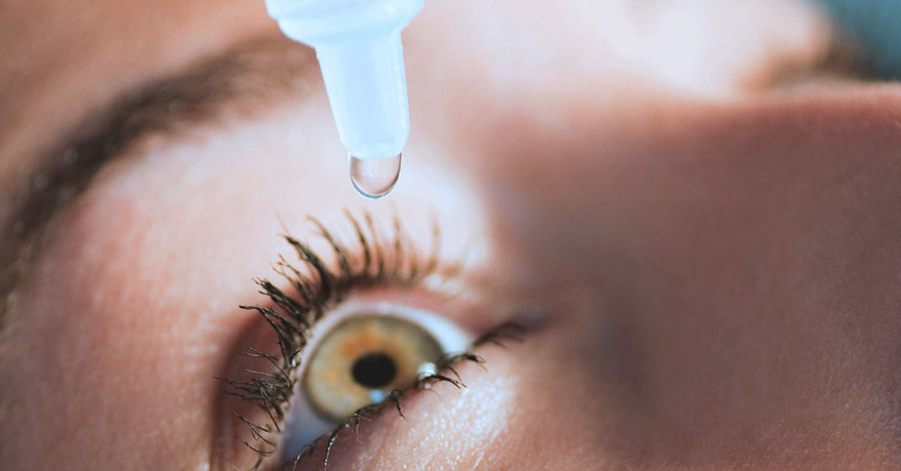 Washing eyes.