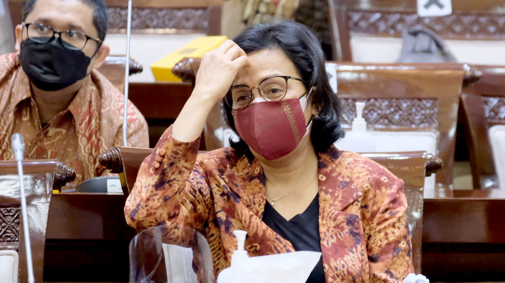 <p>Menteri Keuangan Sri Mulyani Indrawati saat menghadiri rapat kerja dengan komisi XI DPR di komplek Parlemen Senayan, Kamis, 10 Juni 2021. Foto: Ismail Pohan/TrenAsia</p>
