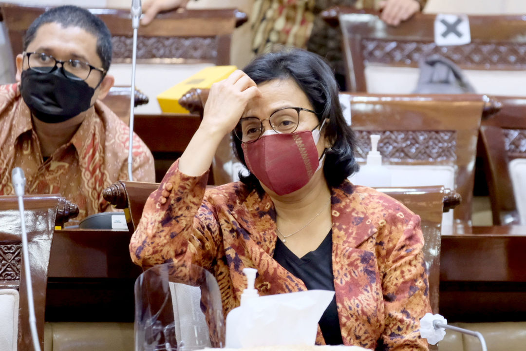 <p>Menteri Keuangan Sri Mulyani Indrawati saat menghadiri rapat kerja dengan komisi XI DPR di komplek Parlemen Senayan, Kamis, 10 Juni 2021. Foto: Ismail Pohan/TrenAsia</p>
