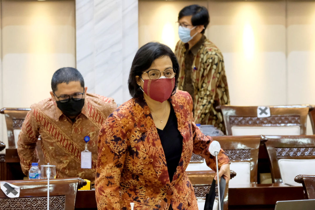 <p>Menteri Keuangan Sri Mulyani Indrawati saat menghadiri rapat kerja dengan komisi XI DPR di komplek Parlemen Senayan, Kamis, 10 Juni 2021. Foto: Ismail Pohan/TrenAsia</p>
