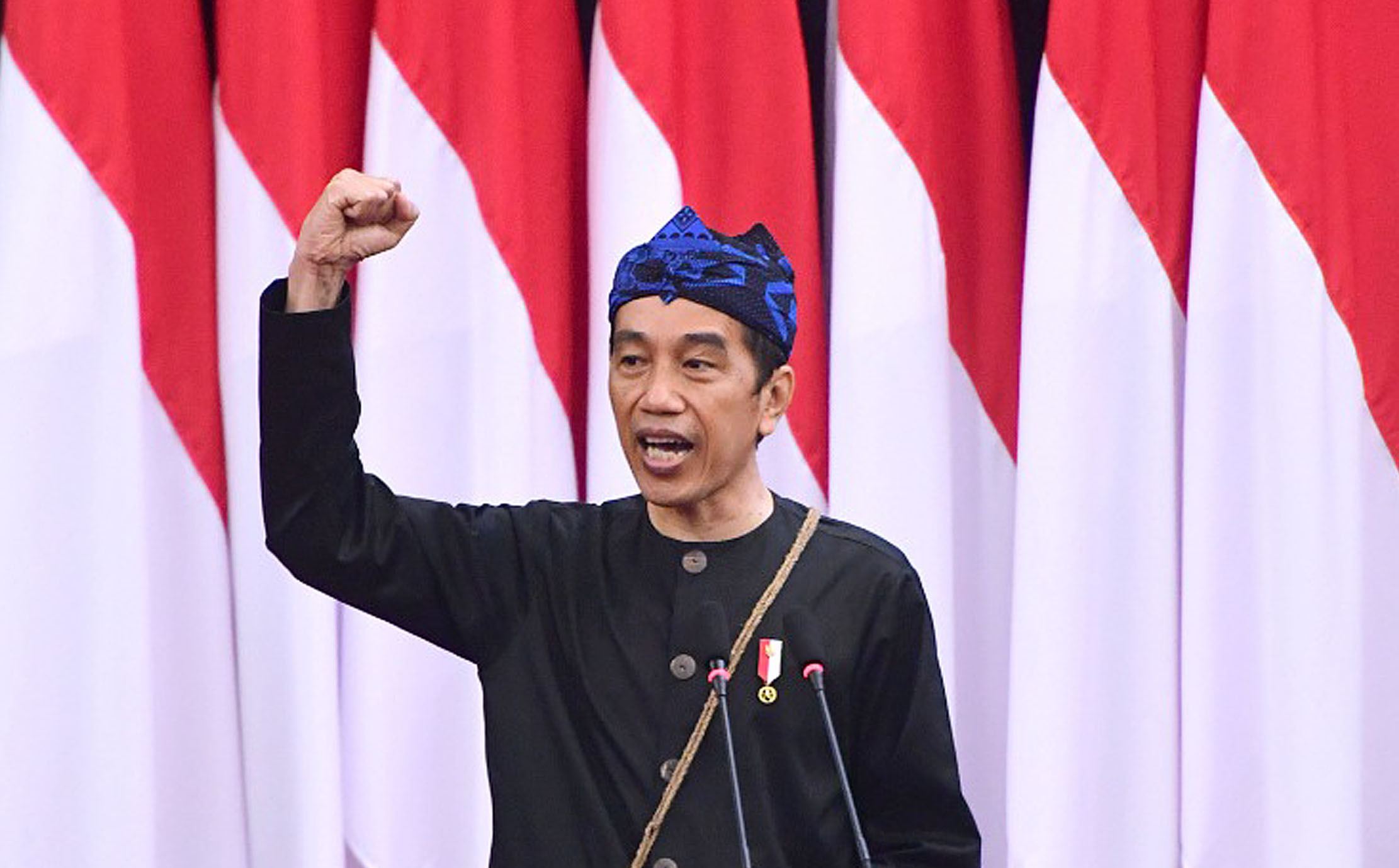 Presiden Joko Widodo menyampaikan pidato kenegaraan pada Sidang Tahunan MPR Tahun 2021 di Gedung Nusantara, Kompleks Parlemen Senayan, Senin 16 Agustus 2021. Foto : Panji Asmoro/TrenAsia