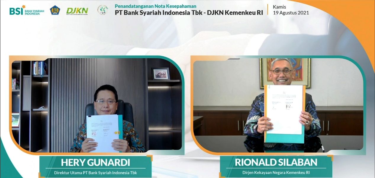 Dirut BSI Hery Gunardi dan Dirjen Kekayaan Negara Kemenkeu Rionald Silaban usai menandatangani Nota Kesepahaman 