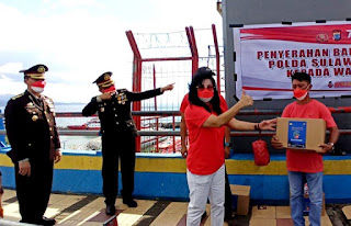 Dinas Kelautan dan Perikanan Provinsi Sulut bersama Polda Sulut menggelar bakti sosial untuk masyarakat. (Foto:Istimewa)