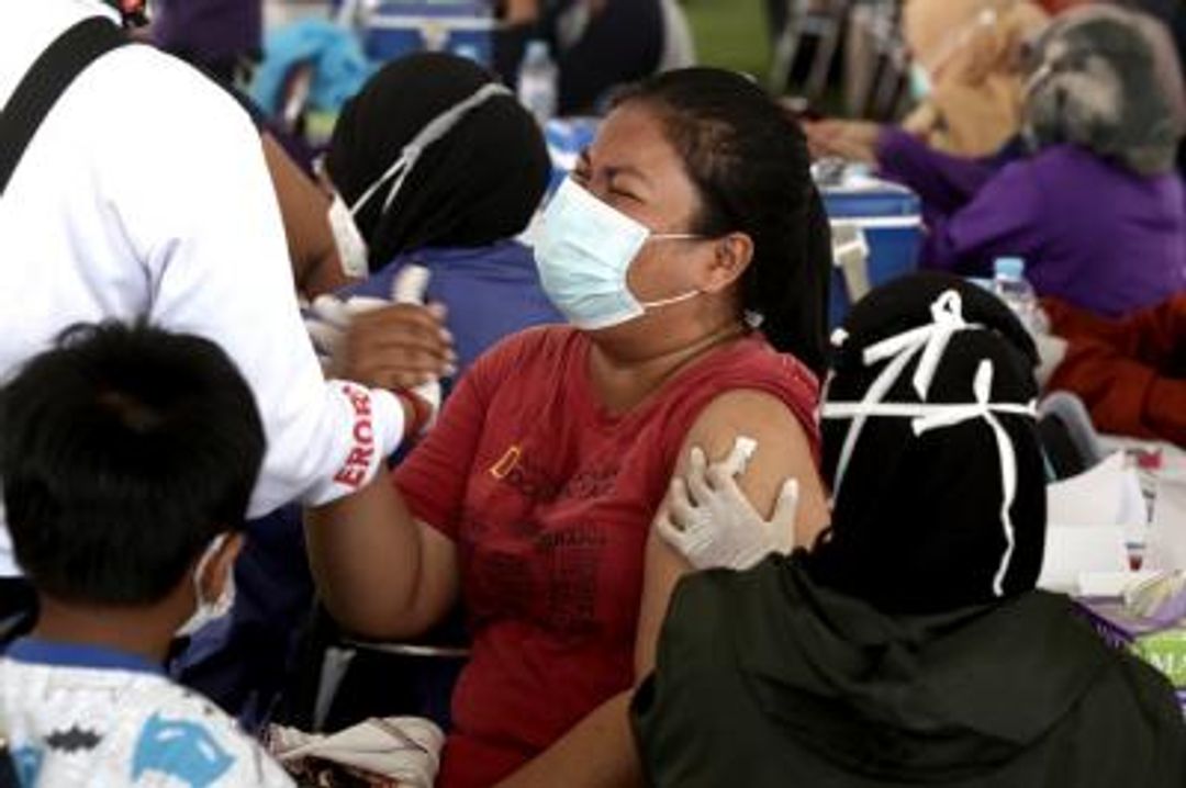 Vaksin yang diberikan warga Surabaya