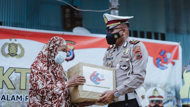 Sambut HUT Ke-66, Satlantas Polres Mabar Bagi Ratusan Paket Sembako