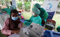Vaksinasi Pemulung Rawakucing - Panji 1.jpg