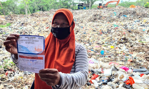 Vaksinasi Pemulung Rawakucing - Panji 6.jpeg