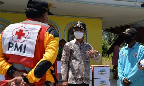 Rahmadi Bantu korban angin puting beliung.jpeg