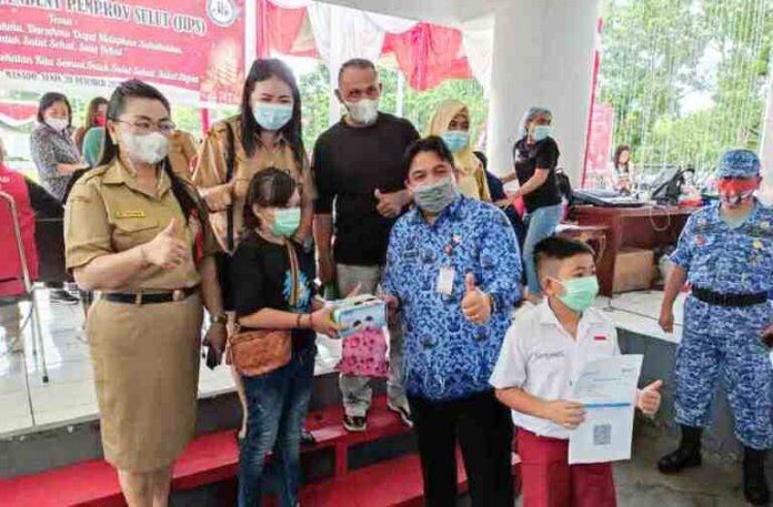 JIPS Gelar Vaksinasi dan Ibadah Natal yang turut dihadiri Kadis Kominfo Sulut Steven Liow. (Foto:Istimewa)