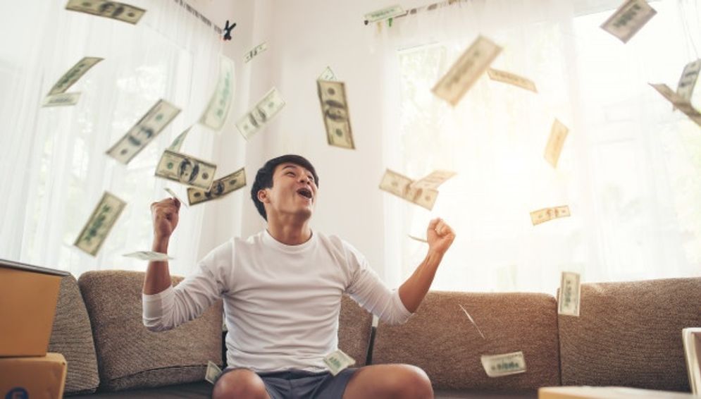 happy-man-with-cash-dollars-flying-home-office-rich-from-business-online-concept_1150-4999.jpg