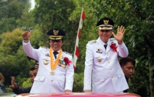 Bupati Minahasa Tenggara James Sumendap dan Wakil Bupati Joke Legi. (Foto:Istimewa)