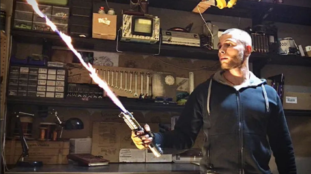 Screenshot 2022-02-07 at 10-15-16 Alex-holding-light-saber-at-full-length_tcm25-689875 jpg (WEBP Image, 610 × 401 pixels).png