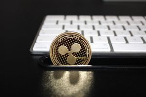 XRP, aset kripto yang digunakan dalam jaringan pembayaran Ripple. 